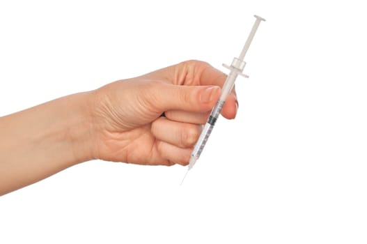 syringe in the woman's hand for making injections