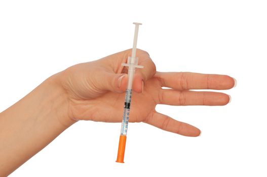 syringe in the woman's hand for making injections