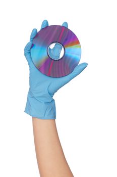 Disk with dangerous confidential audio and video about hacker programs and viruses in a hand of the inspector