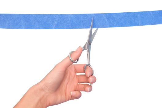 Woman cutting a ribbon with scissors for grand opening