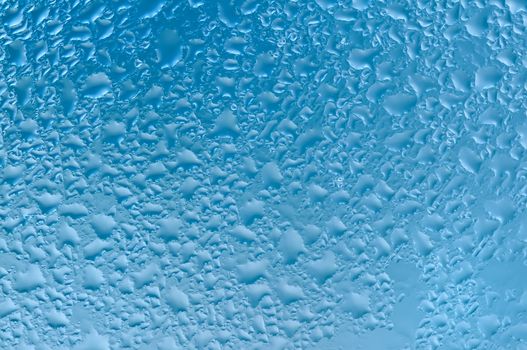 Water raindrops on the window after rain for background