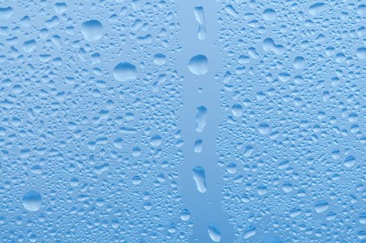 Water raindrops on the window after rain for background
