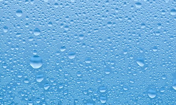 Water raindrops on the window after rain for background