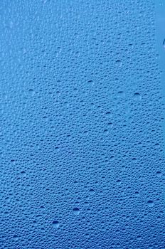 Water raindrops on the window after rain for background