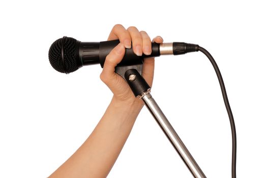 woman holding big black microphone for singing