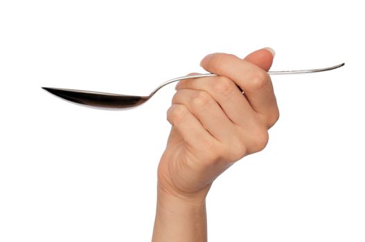 woman holding tablespoon in the hand for feeding a sick person