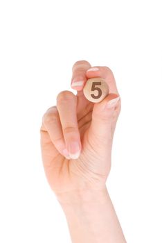 five bingo ball in the hand on white background