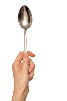 woman holding tablespoon in the hand for feeding a sick person