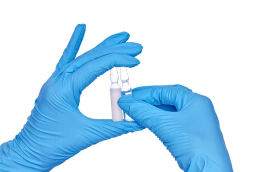 laboratory assistant takes two ampules for making a vaccination