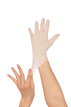 doctor putting on white sterilized medical glove for making operation