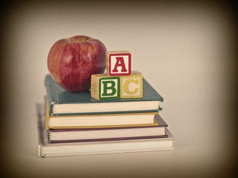 ABC Blocks and Apple on Children's Books in a Retro Vintage Style