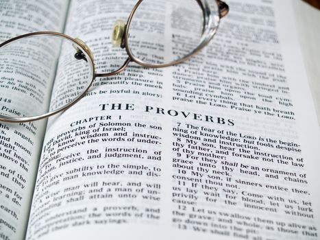 The Bible opened to the Book of Proverbs