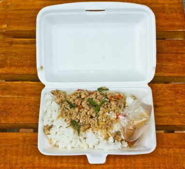 Fried pork with sweet basil foam box.