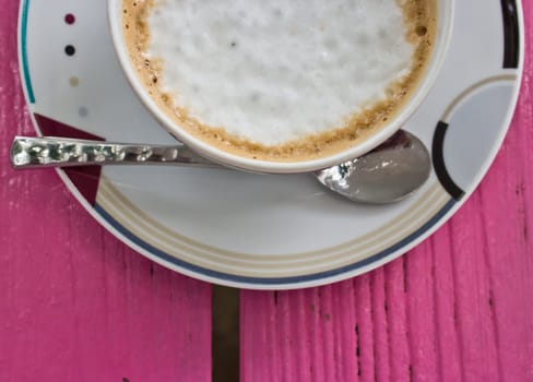 Coffee cup on the table.