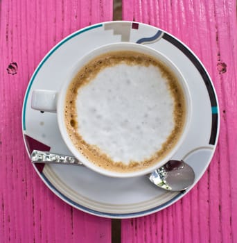 Coffee cup on the table.