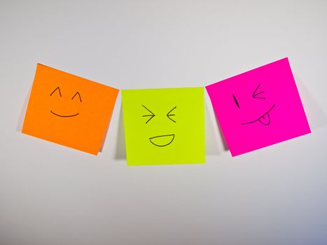 Colorful smile on post-it with white background