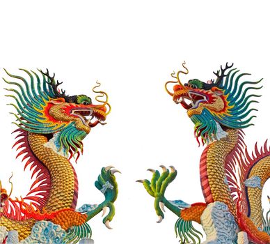 Two colorful dragon statue isolated on white background.The statue of a Chinese dragon is believed that the power and longevity.