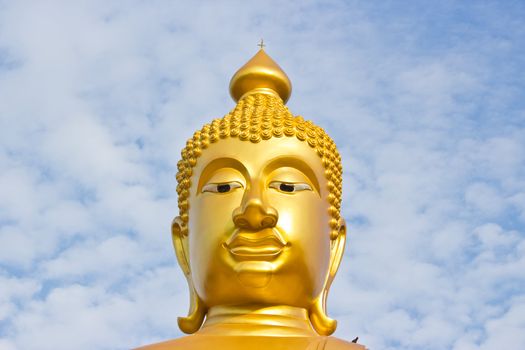 Head golden Buddha statue in a Buddhist temple