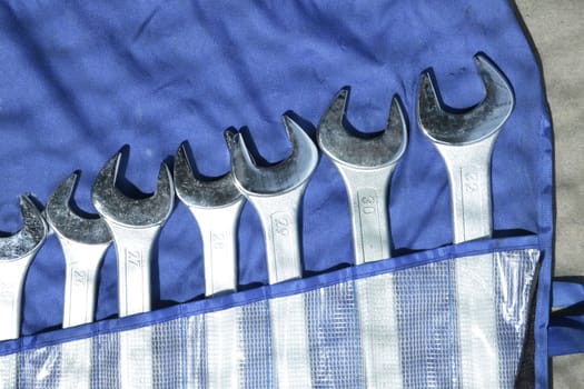 Set of the wrenches in the blue tool's organizer.