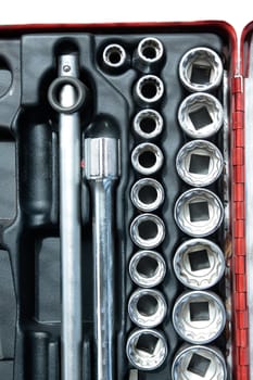 Socket wrench set in toolbox.