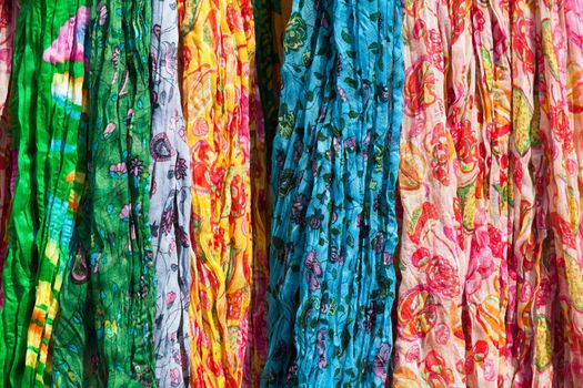 Colorful scarfs on a market stall