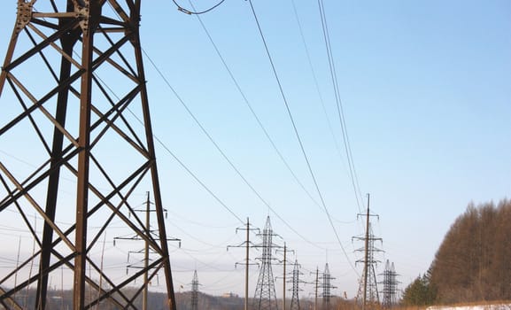 Power transmission line over blue sky