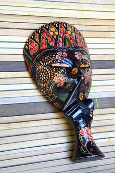 Hand crafted wooden masks work the Gunung Kidul Yogyakarta and sold for souvenir photos