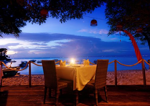 dinner on sunset at beach in Bali, Indonesia 