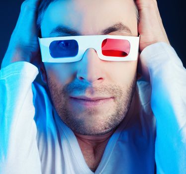 young man, looking through stereo glasses 