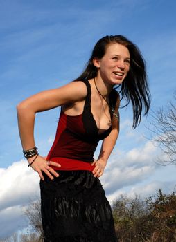 young girl lauging in a day of winter