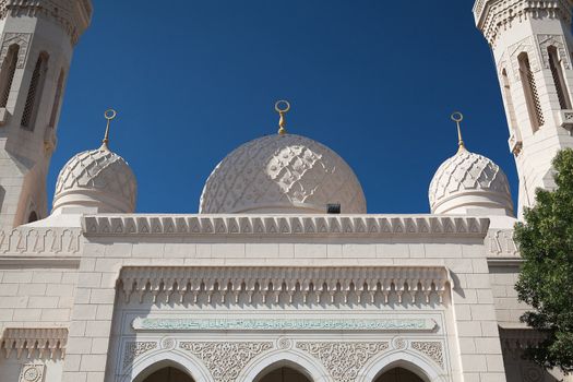 Detail of White Mosque at sunset in Dubai