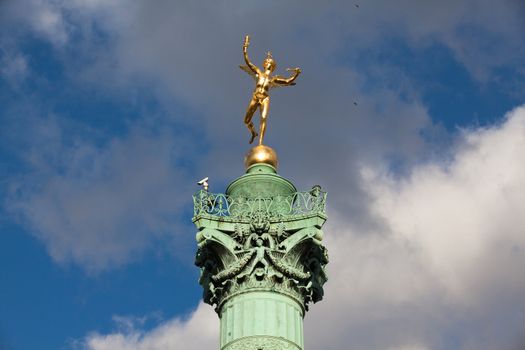 Gilded statue Genie de la Liberte at July Column Place de la Bastille is a square in Paris, where the Bastille prison stood until the Storming of the Bastille during French Revolution France