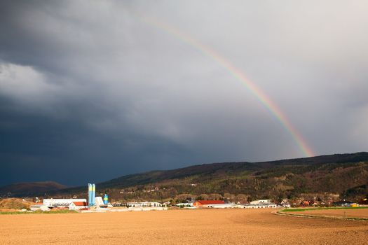 Natural rainbow over Dobrichovice in Czech Republic
