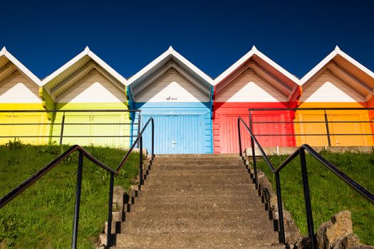 Beach huts at sunrise in Great Britain