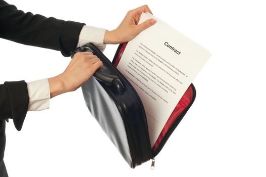 Businesswoman taking out from a suitcase contract for new employees