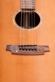 metal strings of the classical six-string acoustic guitar