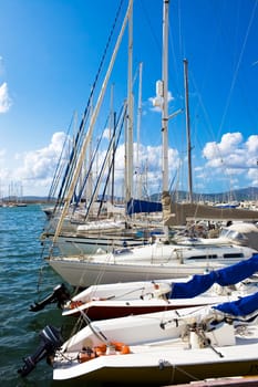 Classic white yachts ancored in Alghero, Sardinia