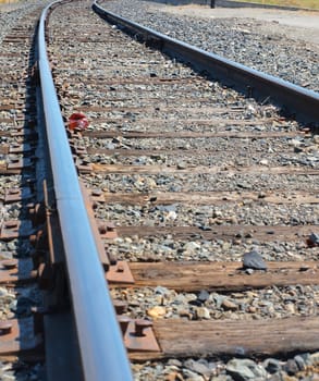 One Set of Railroad Tracks on a Sunny Day