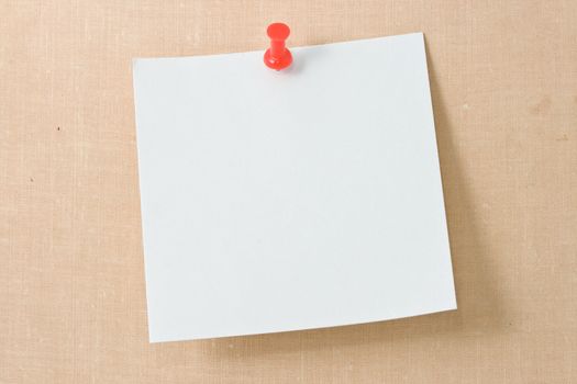 Note white paper tacked on a wall