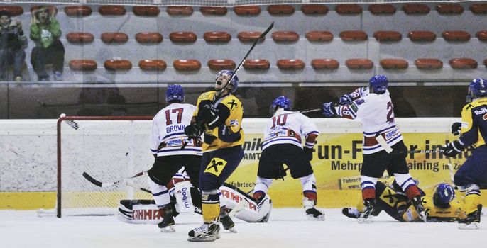 ZELL AM SEE; AUSTRIA - OCT 2: Austrian National League. Scrum in front of the net of ATSE Graz (white jersey). Game between EK Zell am See and ATSE Graz (Result 2-3) on October 2, 2011 in Zell am See