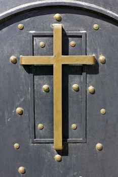 Holy Cross on the old door in the orthodox church in Cana of Galilee,Israel