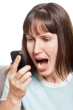 Amazed or surprised woman holding mobile phone in hand and angry screaming