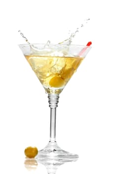 Olive splashing on martini glass isolated on white background