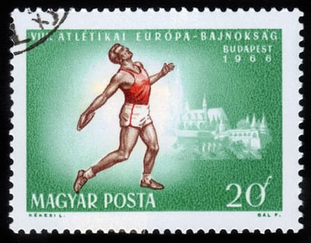 HUNGARY - CIRCA 1966: A stamp printed in Hungary shows Discus Thrower and Matthias Church with inscription and name of series "VIII European Athletic Championships, Budapest, circa 1966