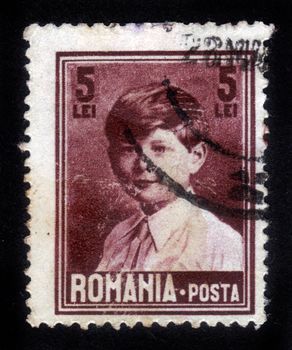 ROMANIA - CIRCA 1928: A stamp printed in Romania shows portrait of King Michael , in childhood , circa 1928