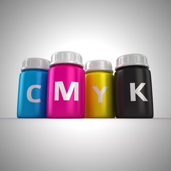 Four bottles with paint of cmyk colors