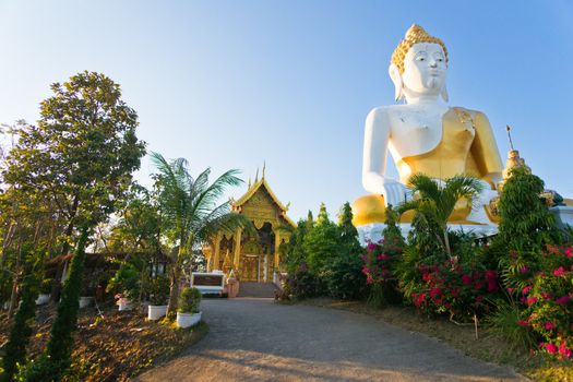 Statue of big Buddha in the temple Wat Doikam, Chiang Mai, Thailand