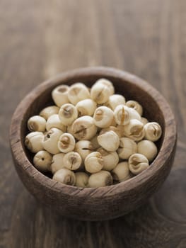 close up of a bowl of lotus seeds