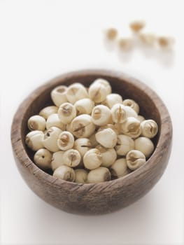 close up of a bowl of lotus seeds