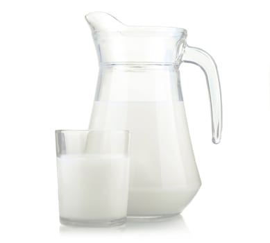 Jug and glass of milk isolated on white background
